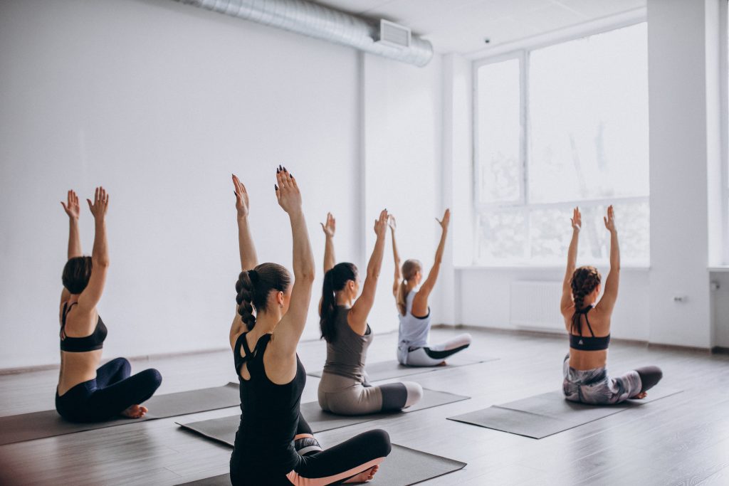 yoga group classes inside the gym